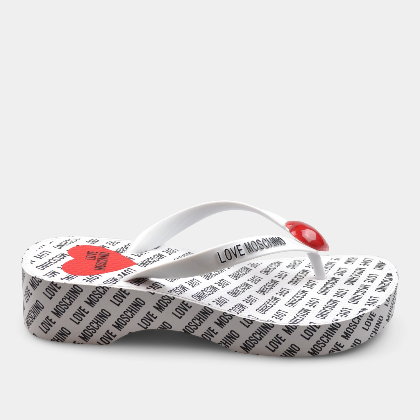 LOVE MOSCHINO LOW HEEL FLIP FLOPS IN WHITE