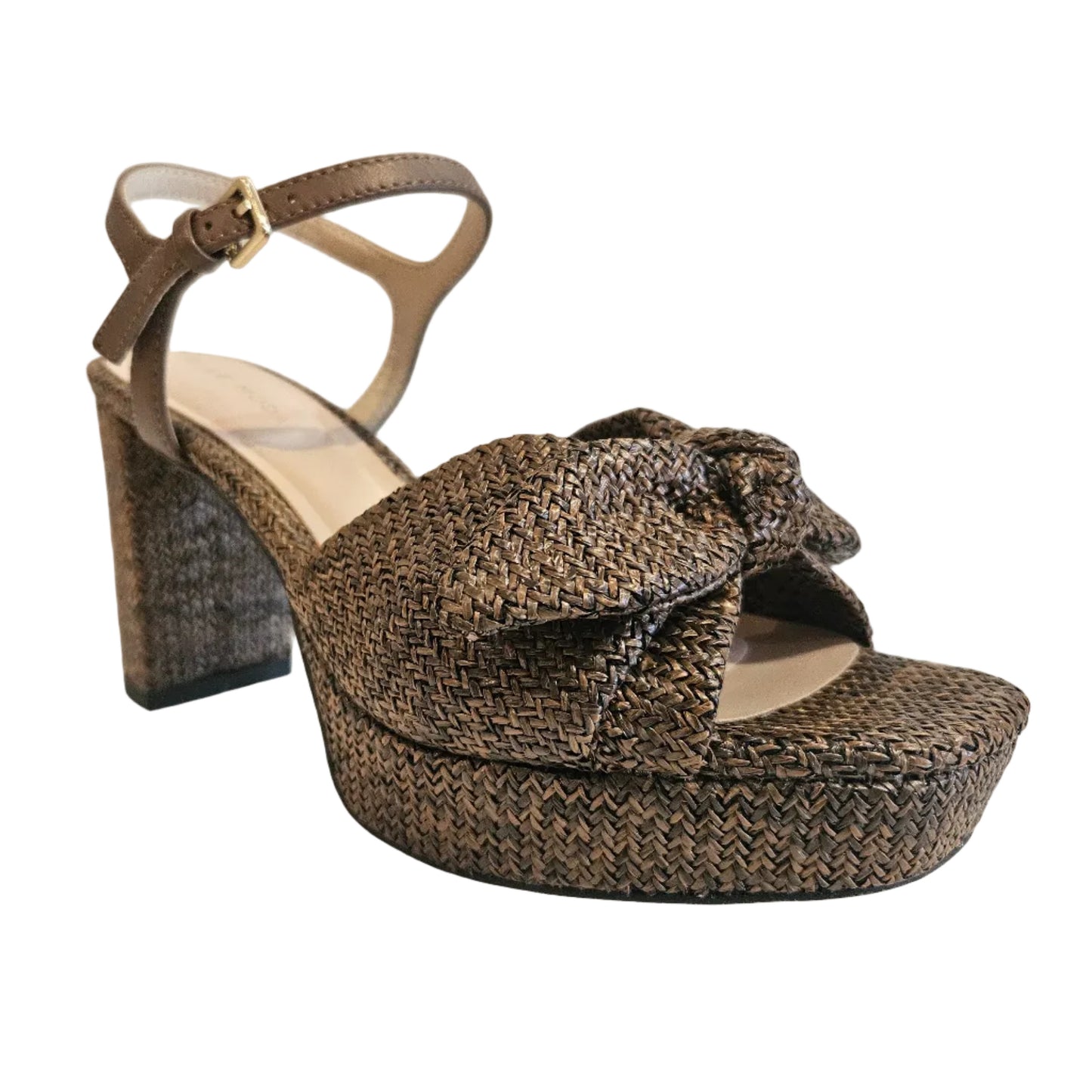 Brown woven sandal with a platform sole on a white background
