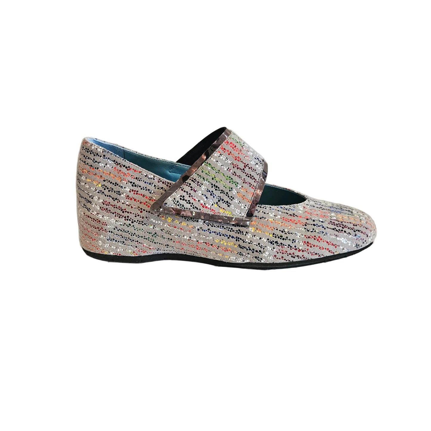 Multicolored textured shoe in a white void