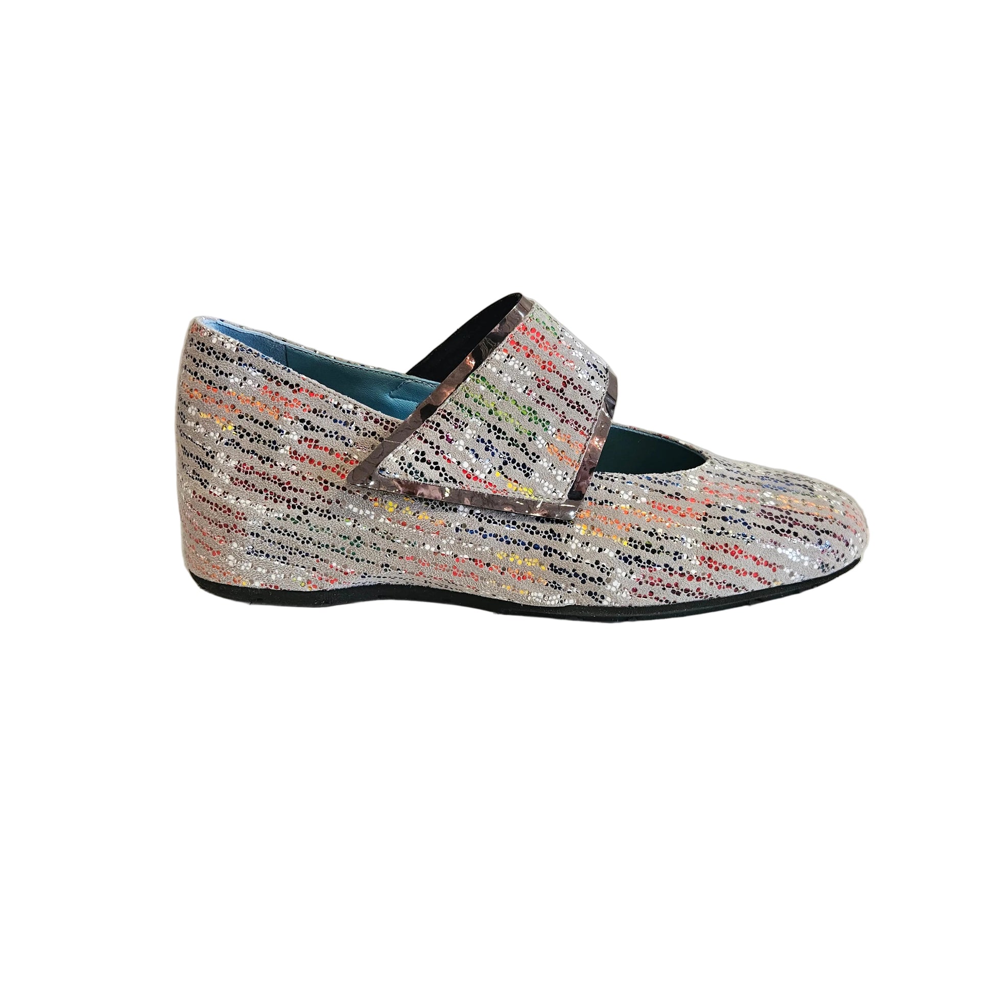 Multicolored textured shoe in a white void