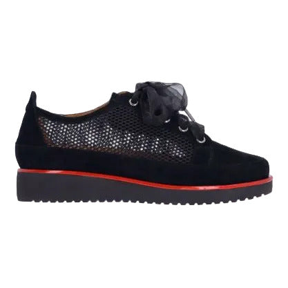 Black shoe with red sole on a white background